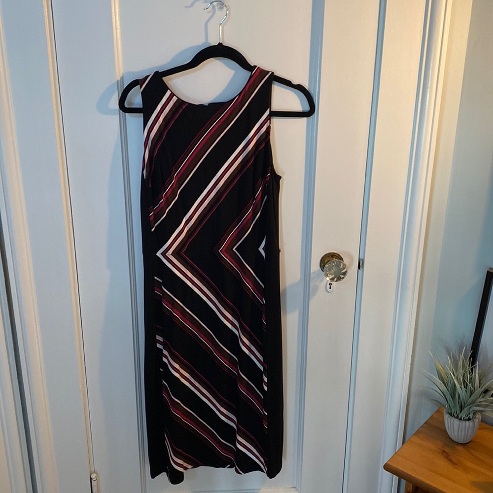 Asymmetrical “pencil” dress… perfect for buttoned-up events!